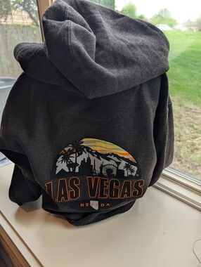 Las Vegas Graphic Hoodie - Black with Orange and Yellow Print